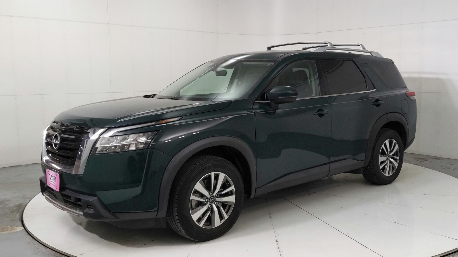 Used 2023 Obsidian Green Pearl Nissan SL image 1