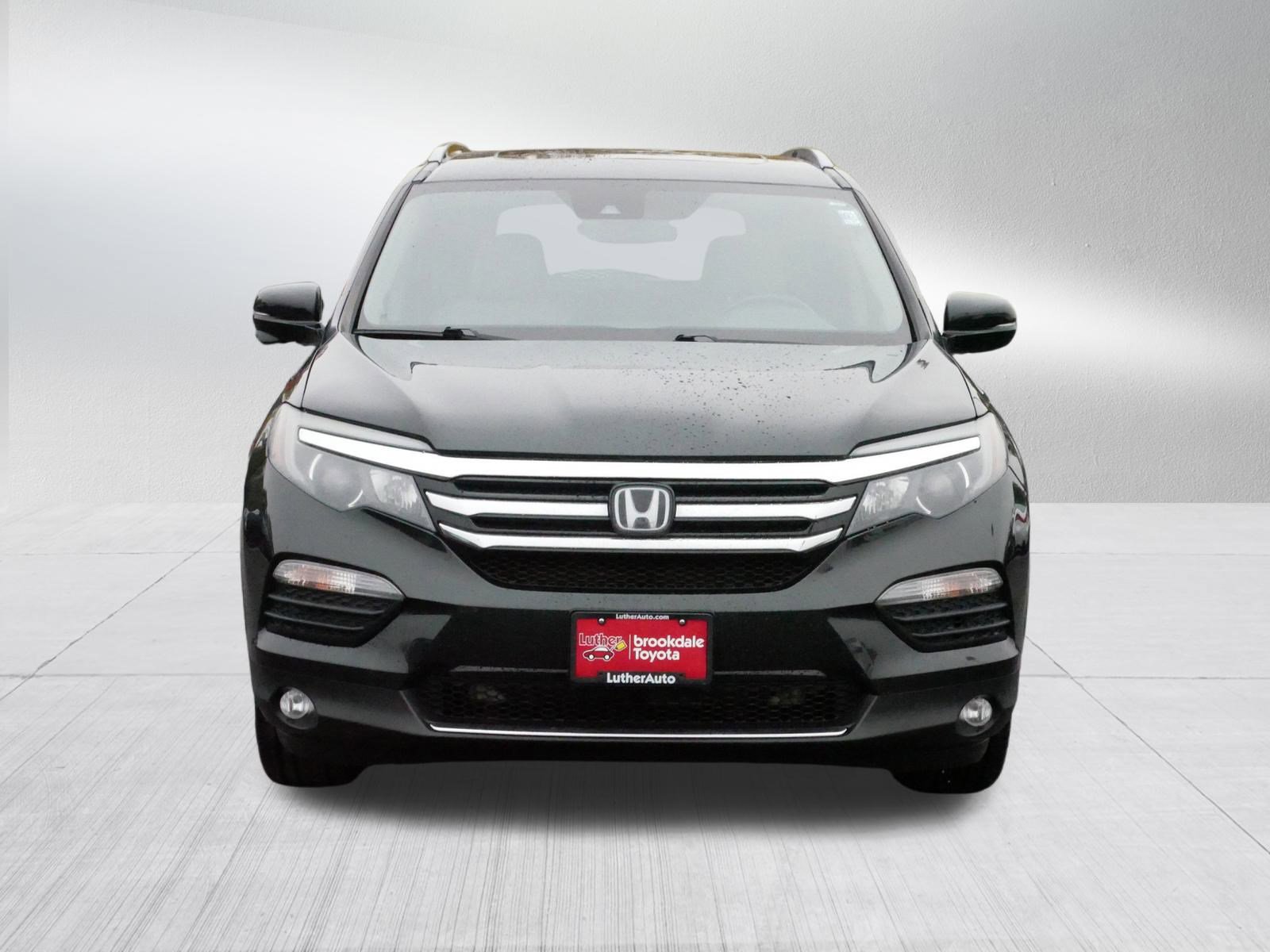 Used 2016 Honda Pilot Touring with VIN 5FNYF6H9XGB037074 for sale in Brooklyn Center, Minnesota
