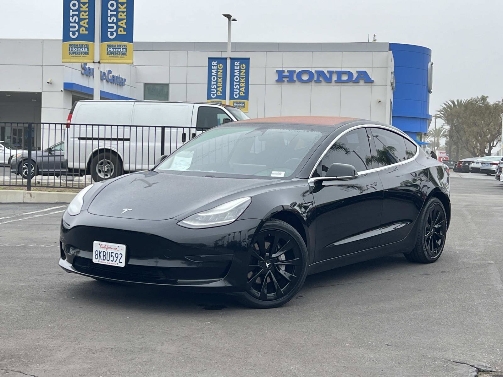 Used 2019 Tesla Model 3 Base with VIN 5YJ3E1EA1KF297676 for sale in Huntington Beach, CA
