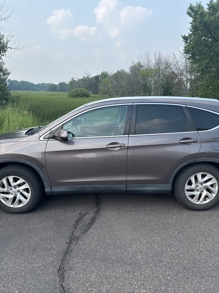 Used 2016 Honda CR-V EX-L with VIN 2HKRM4H71GH607302 for sale in Minneapolis, Minnesota
