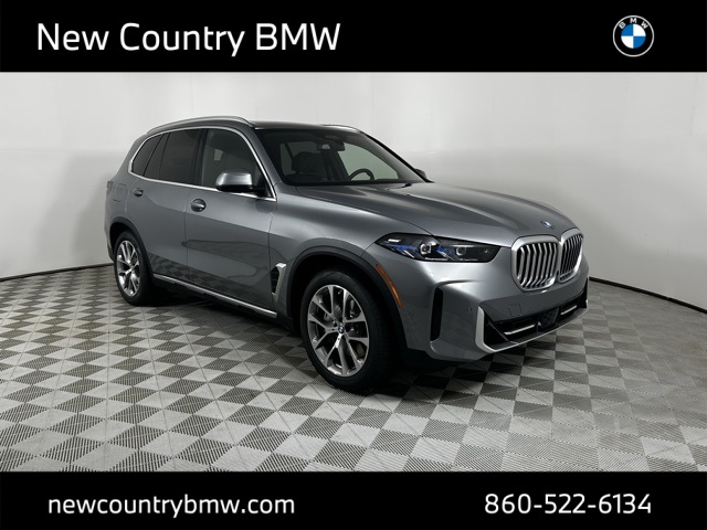 New 2026 Skyscraper Grey Metallic BMW xDrive50e image 1