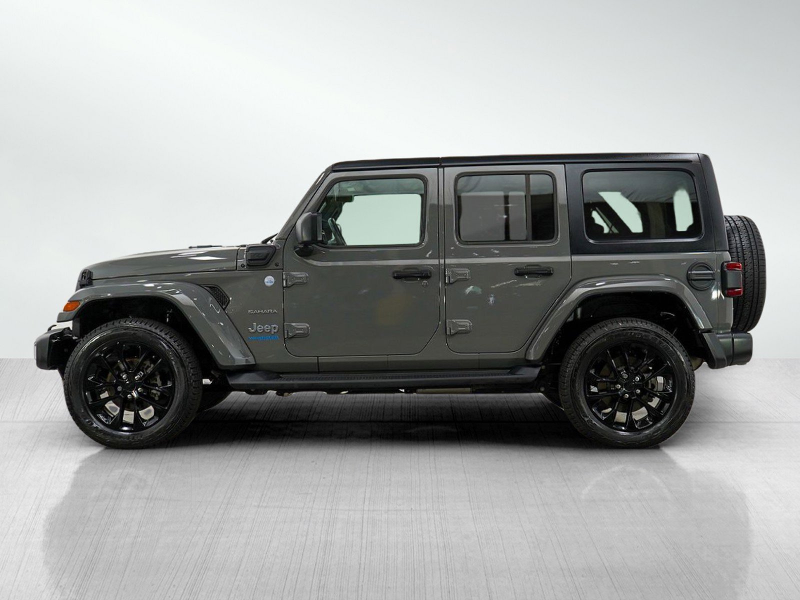 Used 2021 Jeep Wrangler Unlimited Sahara 4XE with VIN 1C4JJXP60MW777320 for sale in Bloomington, Minnesota