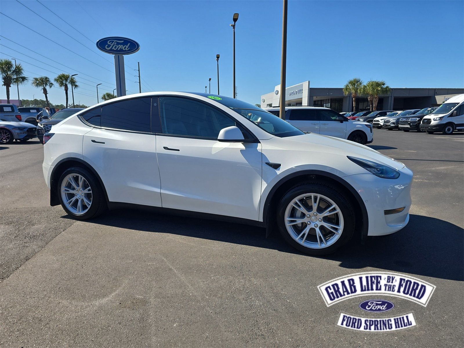 Used 2021 Tesla Model Y Standard Range with VIN 5YJYGDED3MF130394 for sale in Spring Hill, FL