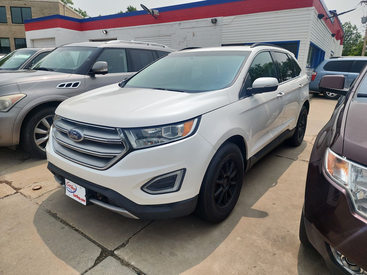 Used 2015 White Ford SEL image 1