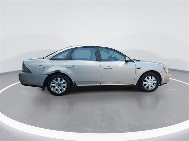 Used 2009 Ford Taurus SE with VIN 1FAHP23W19G114707 for sale in Grand Rapids, MI