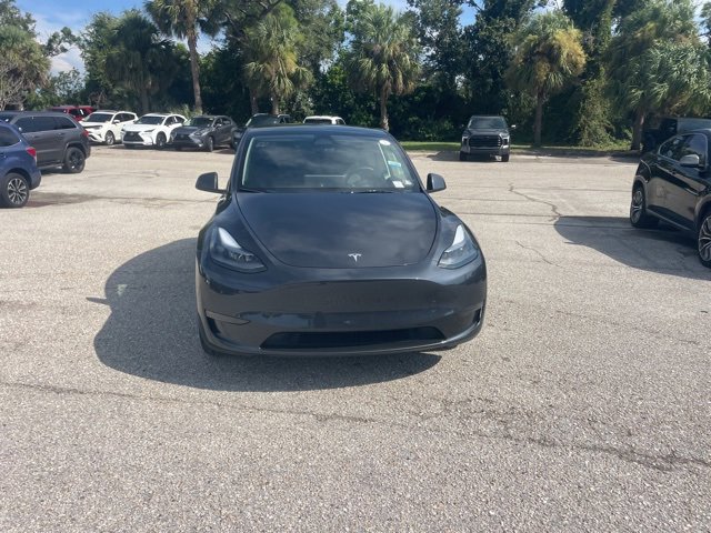 Used 2024 Tesla Model Y Long Range with VIN 7SAYGDED1RF048187 for sale in Northfield, Minnesota