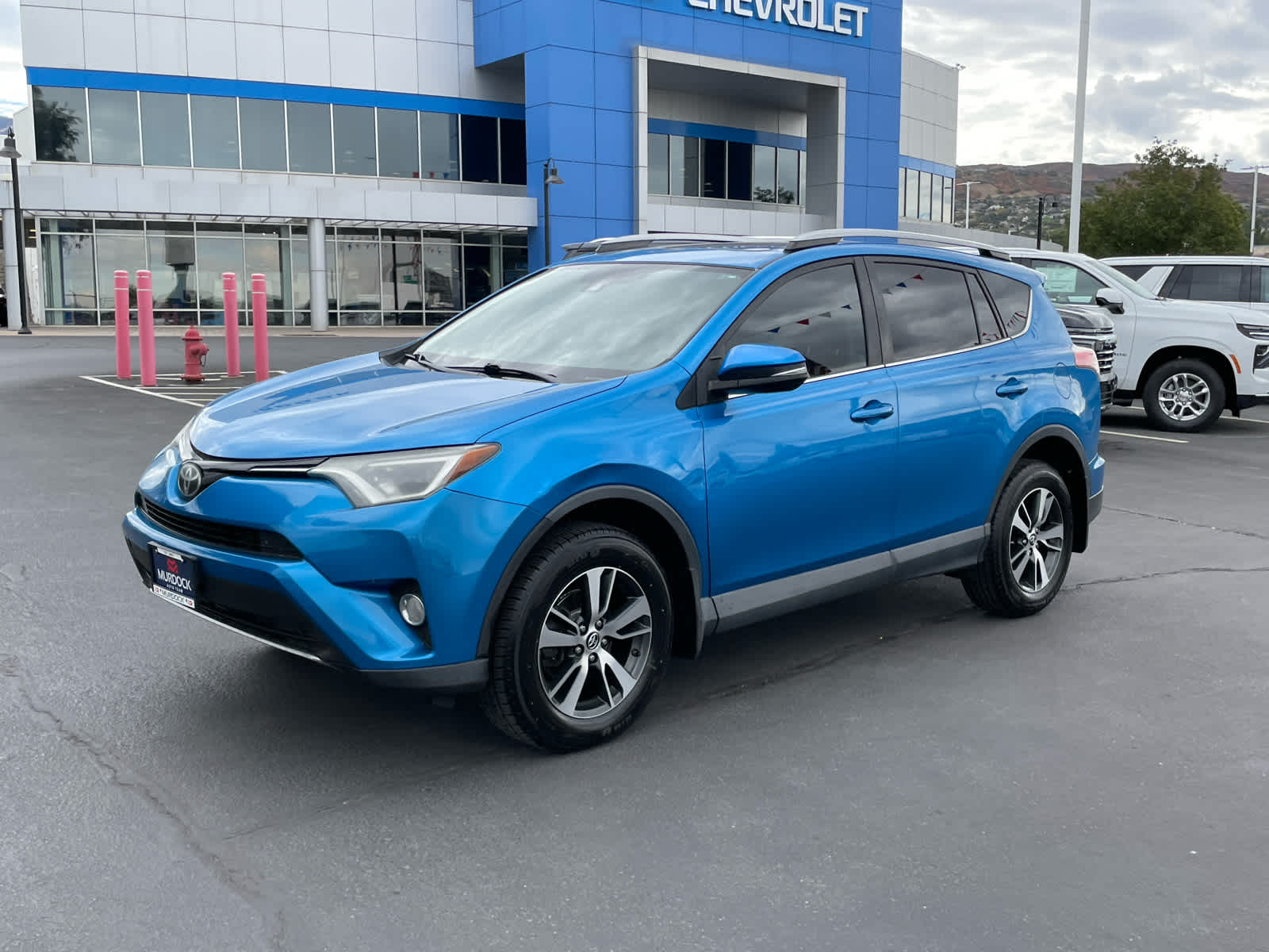 Used 2017 Toyota RAV4 XLE with VIN 2T3RFREV0HW669083 for sale in Woods Cross, UT