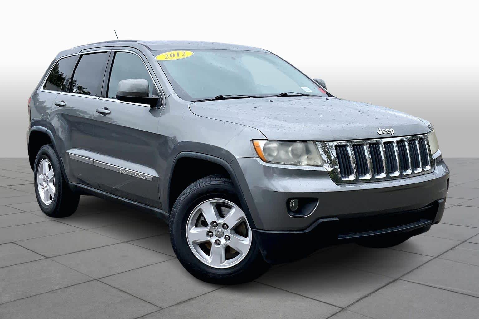 Used 2012 Jeep Grand Cherokee Laredo with VIN 1C4RJEAG4CC307297 for sale in Gulfport, MS