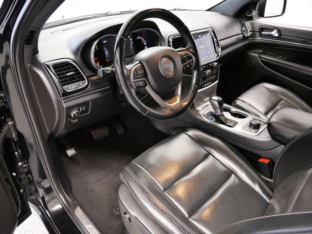 Used 2021 Jeep Grand Cherokee 80th Edition with VIN 1C4RJFBG0MC669214 for sale in Coon Rapids, Minnesota