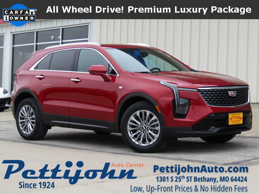 Used 2024 Radiant Red Tintcoat Cadillac Premium Luxury image 1