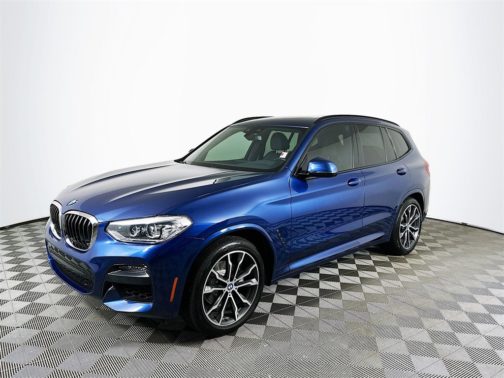 Used 2020 Blue Metallic BMW sDrive30i image 1