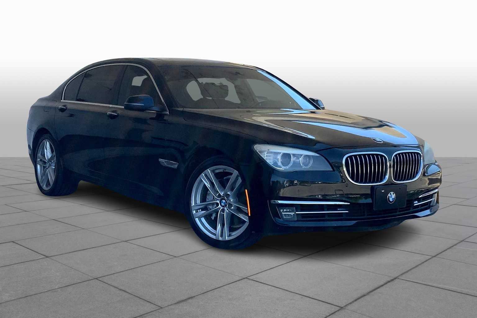 Used 2013 BMW 7 Series 740i with VIN WBAYE4C52DD137083 for sale in Panama City, FL