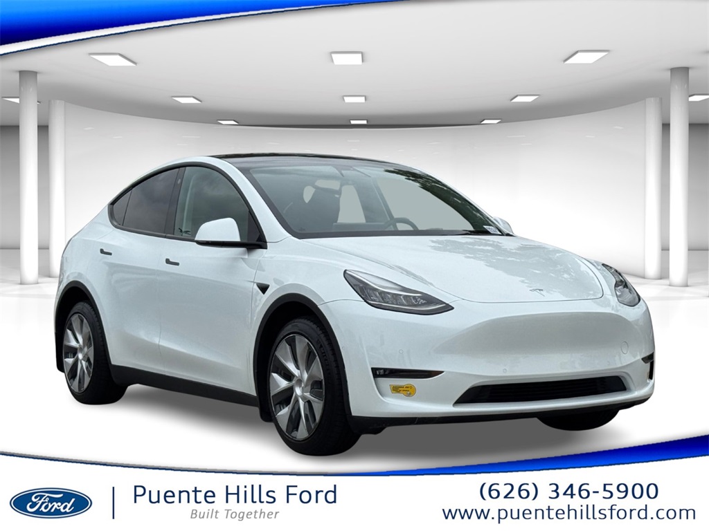 Used 2022 Tesla Model Y Long Range with VIN 7SAYGDEEXNF364772 for sale in Northfield, Minnesota