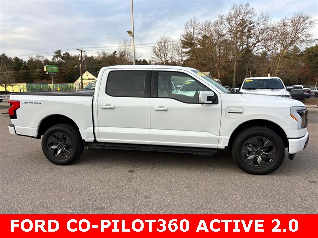 Used 2022 Ford F-150 Lightning Lariat with VIN 1FT6W1EV4NWG14167 for sale in Raynham, MA