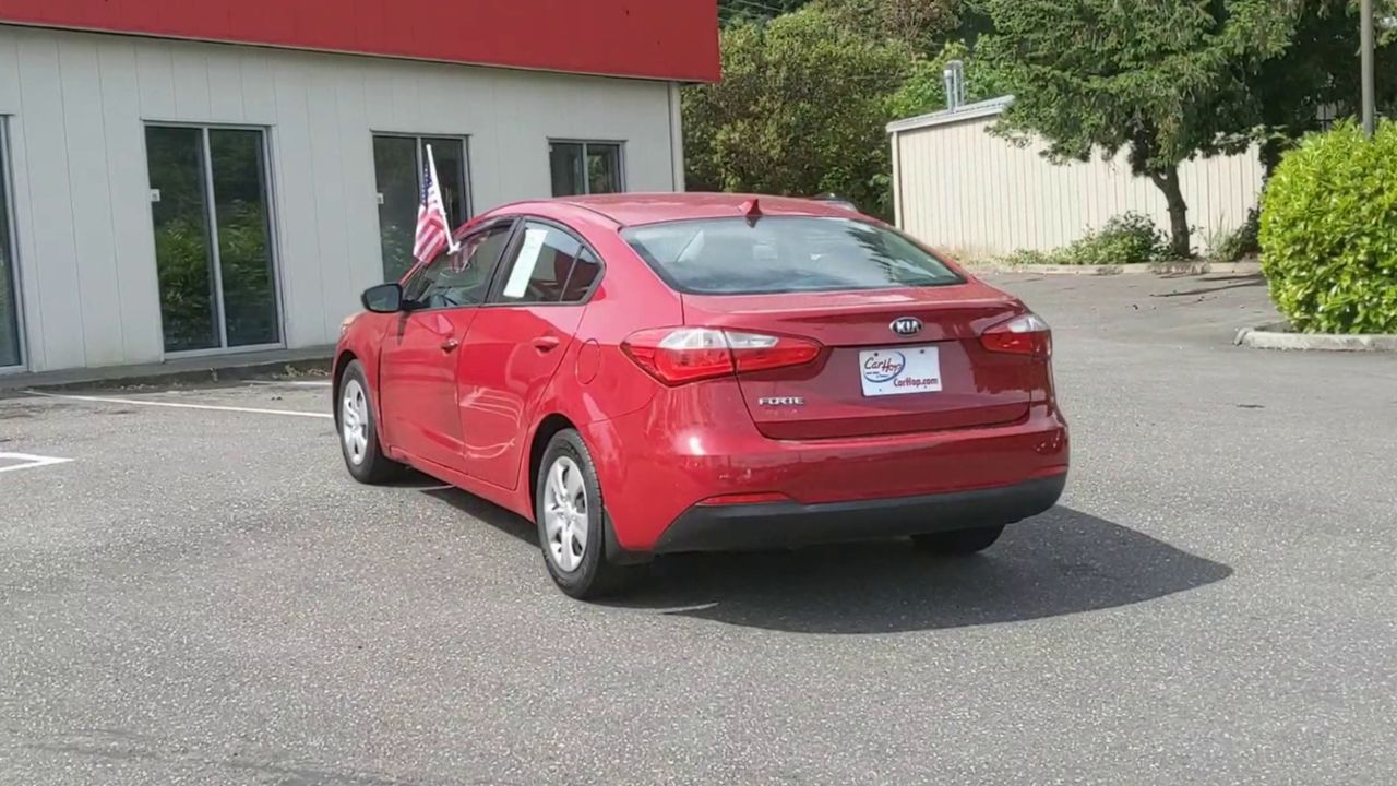 Used 2016 Red Kia LX image 1