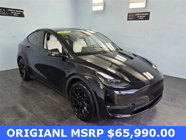 Used 2023 Tesla Model Y Long Range with VIN 7SAYGAEE2PF967104 for sale in Northfield, Minnesota