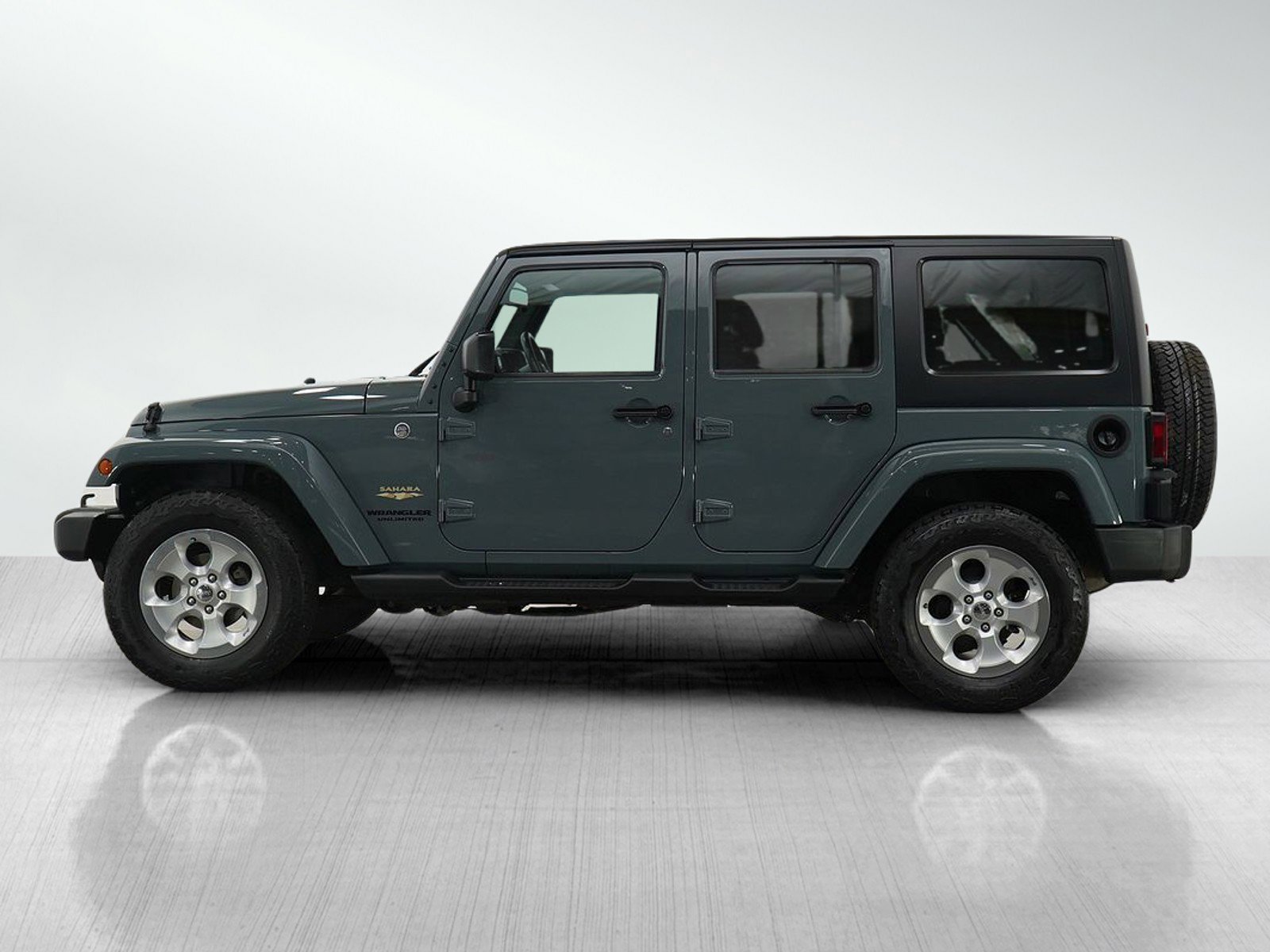 Used 2014 Jeep Wrangler Unlimited Sahara with VIN 1C4BJWEG5EL305613 for sale in Bloomington, Minnesota