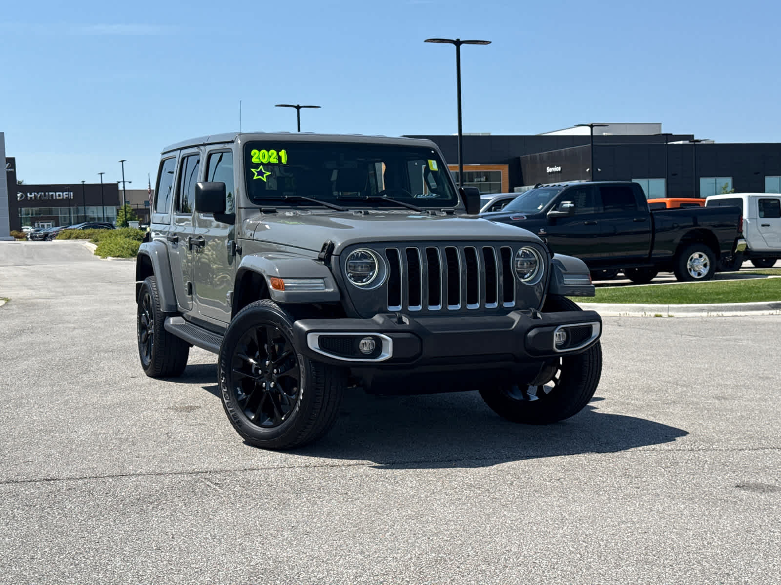 Used 2021 Jeep Wrangler Unlimited Sahara 4XE with VIN 1C4JJXP60MW676763 for sale in Kansas City