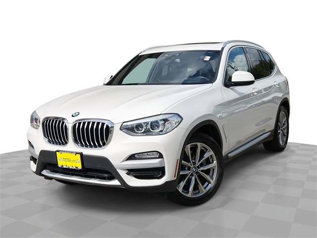 Used 2019 White BMW sDrive30i image 1