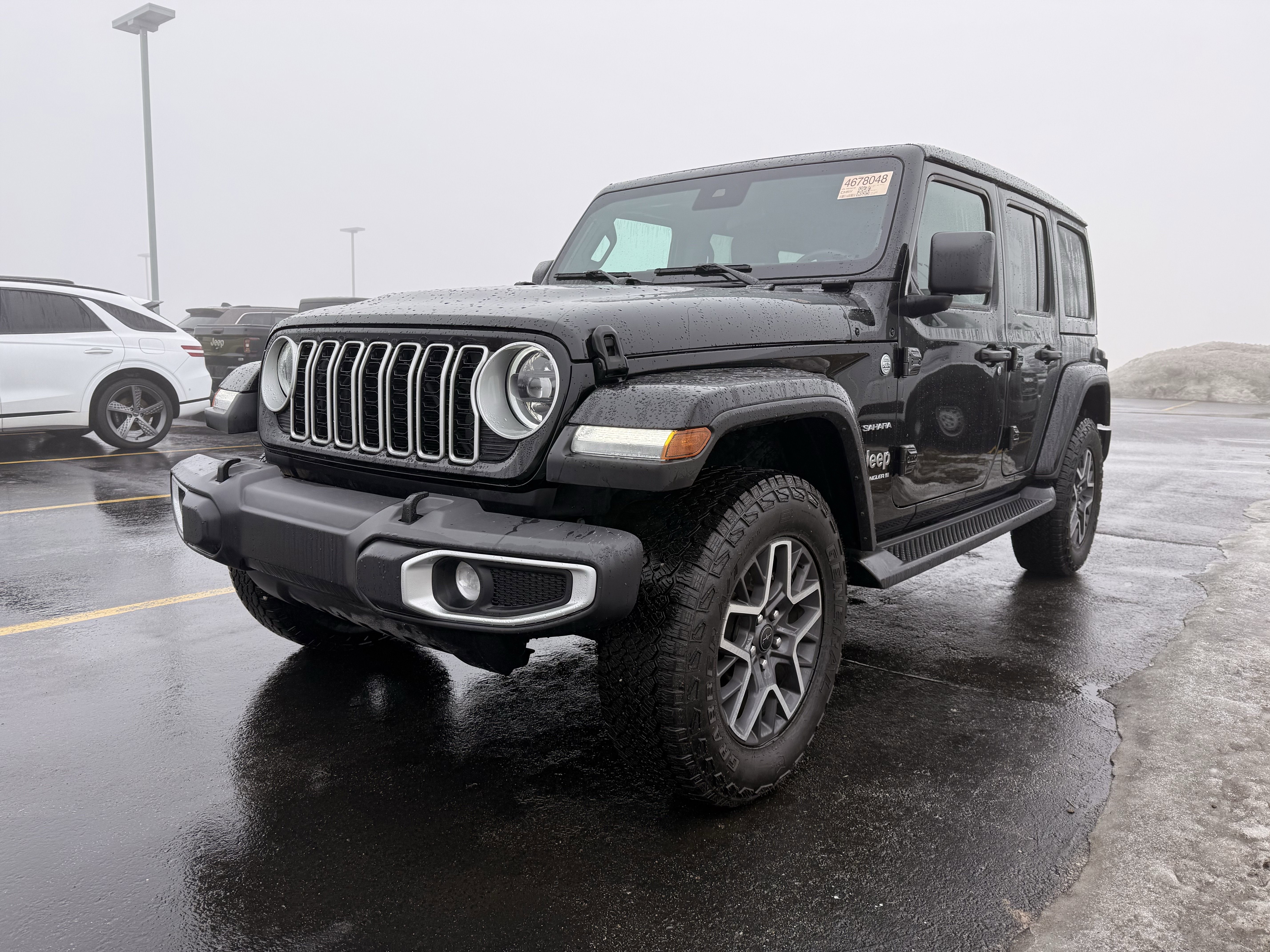Used 2024 Jeep Wrangler 4-Door Sahara with VIN 1C4PJXEG5RW359722 for sale in Burnsville, Minnesota