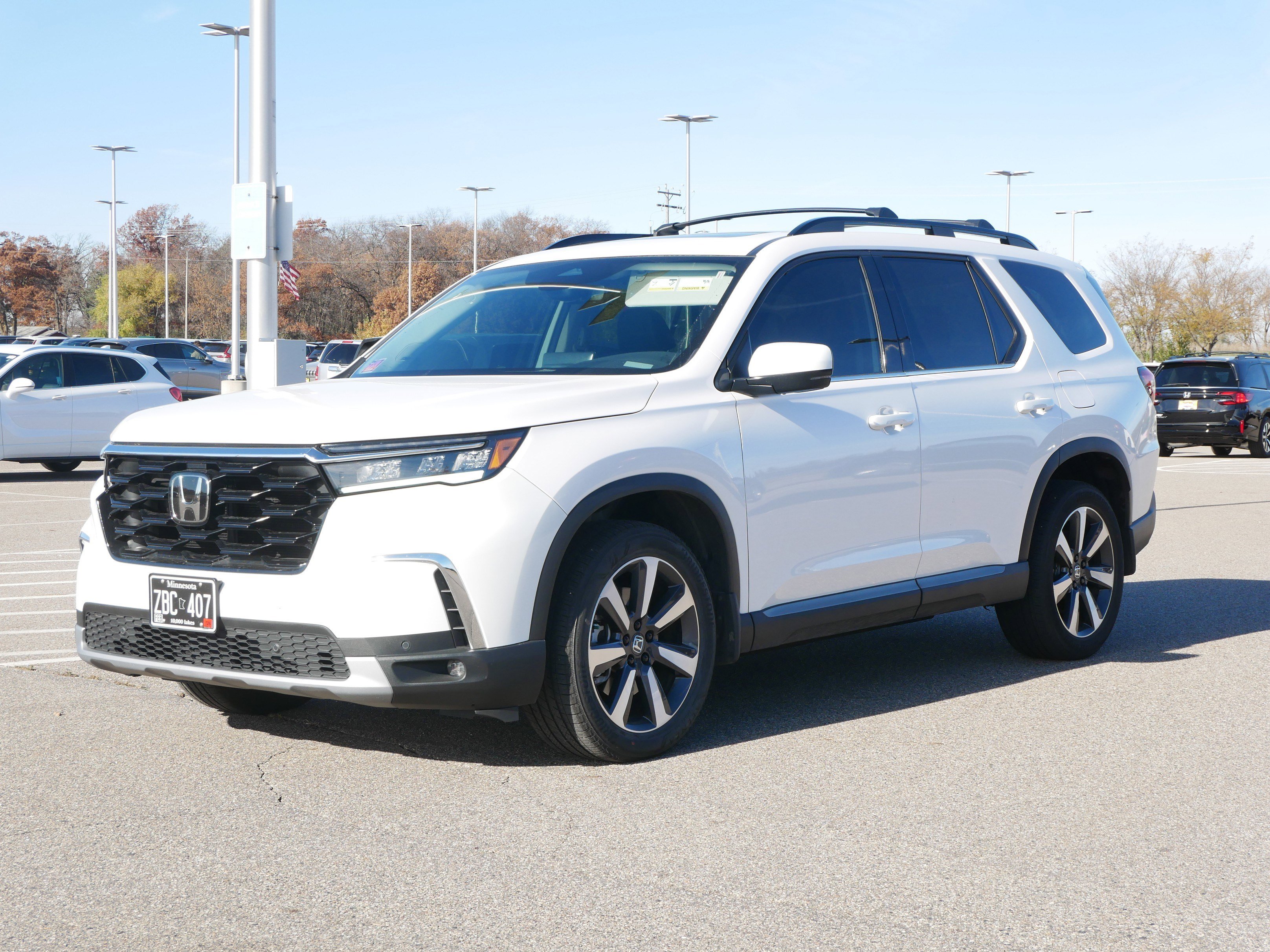 Used 2024 Honda Pilot Touring with VIN 5FNYG1H71RB039023 for sale in Waite Park, Minnesota