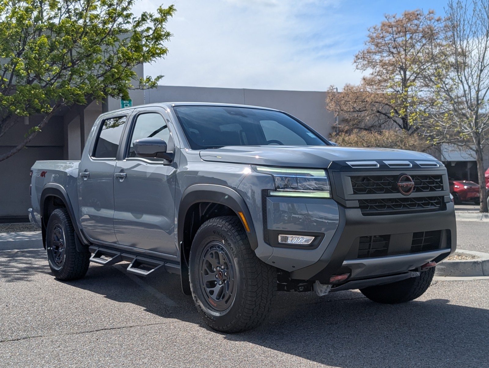 New 2025 Boulder Gray Pearl Nissan Crew Cab PRO-4X® image 1