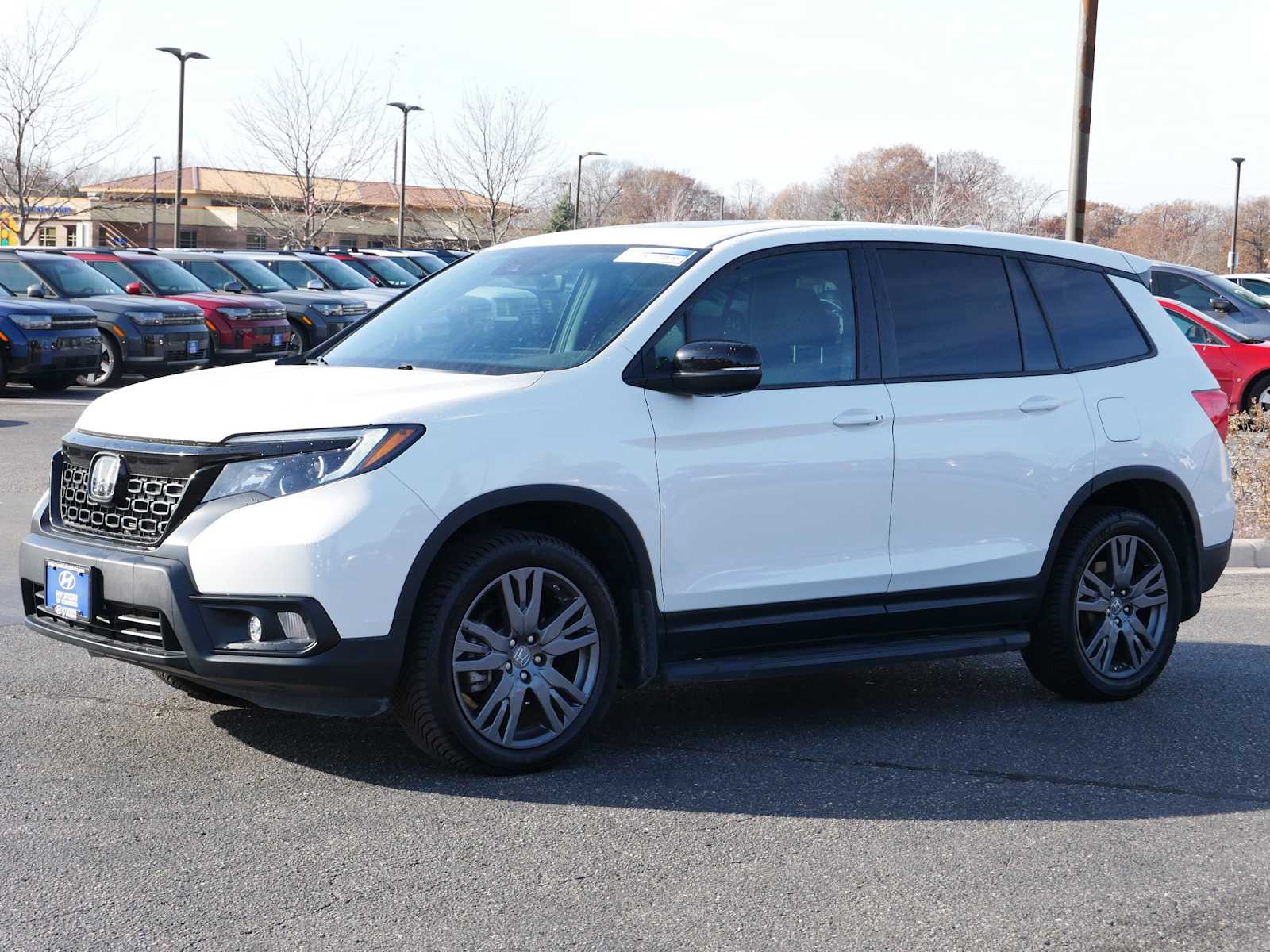 Used 2021 Honda Passport EX-L with VIN 5FNYF8H56MB011883 for sale in Mankato, Minnesota