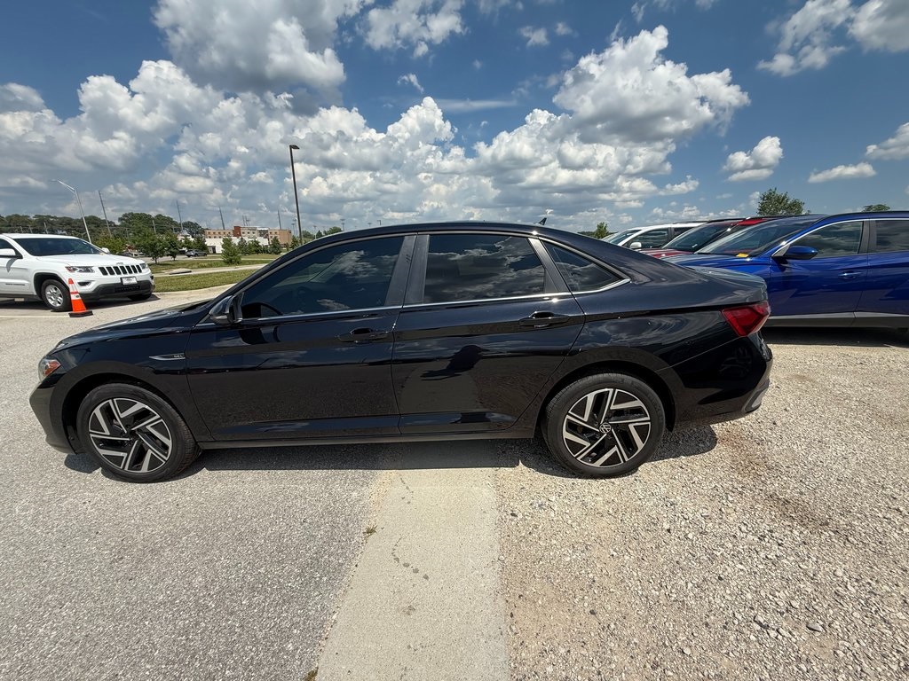 Used 2022 Volkswagen Jetta SEL with VIN 3VWGM7BU0NM031228 for sale in Kansas City
