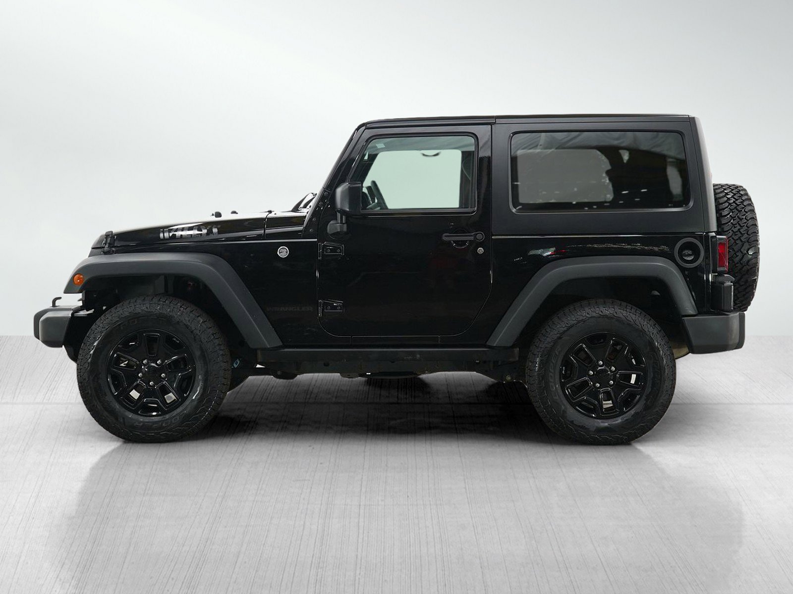 Used 2016 Jeep Wrangler Willys Wheeler with VIN 1C4AJWAG6GL140580 for sale in Hopkins, Minnesota