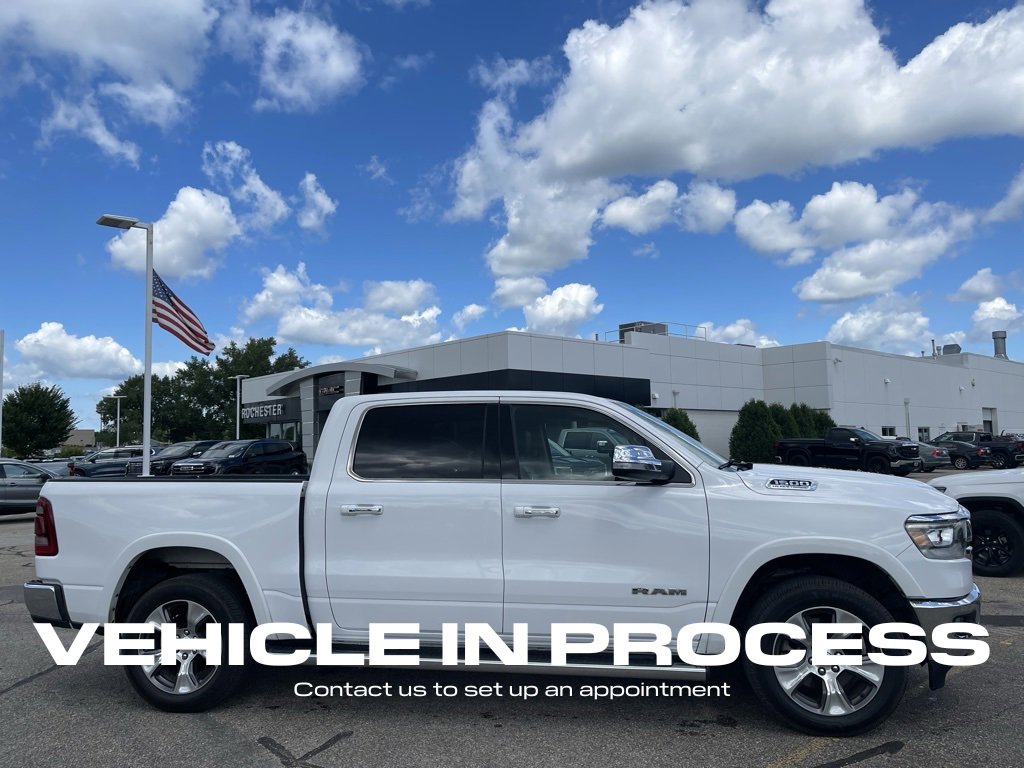 Used 2021 RAM Ram 1500 Pickup Laramie with VIN 1C6SRFJTXMN652859 for sale in Rochester, Minnesota