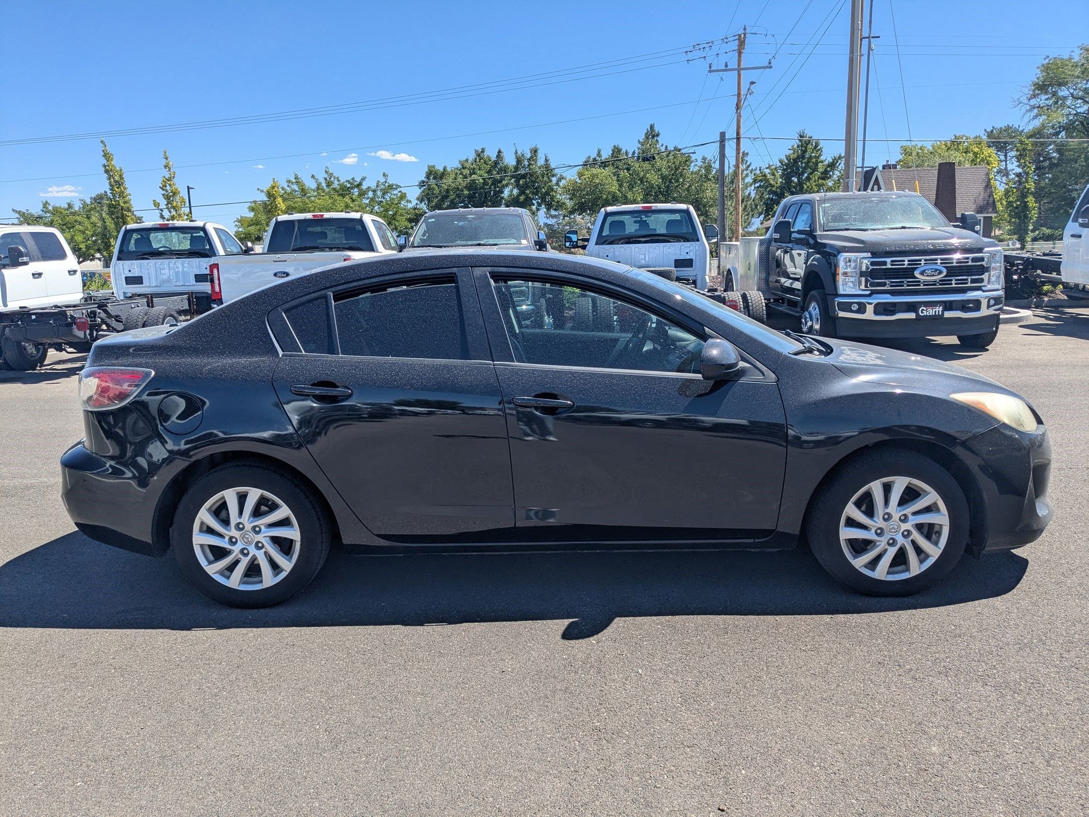 Used 2012 Mazda MAZDA3 i Grand Touring with VIN JM1BL1W71C1596616 for sale in West Valley City, UT