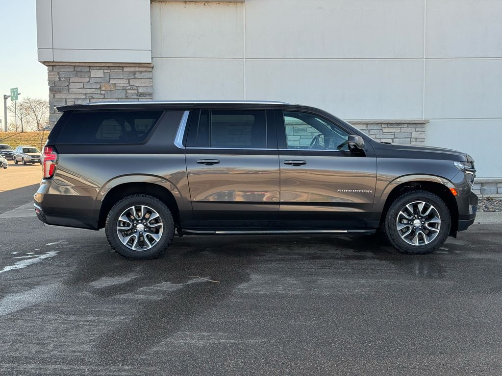 Used 2021 Chevrolet Suburban LT with VIN 1GNSKCKD8MR276696 for sale in Coon Rapids, Minnesota