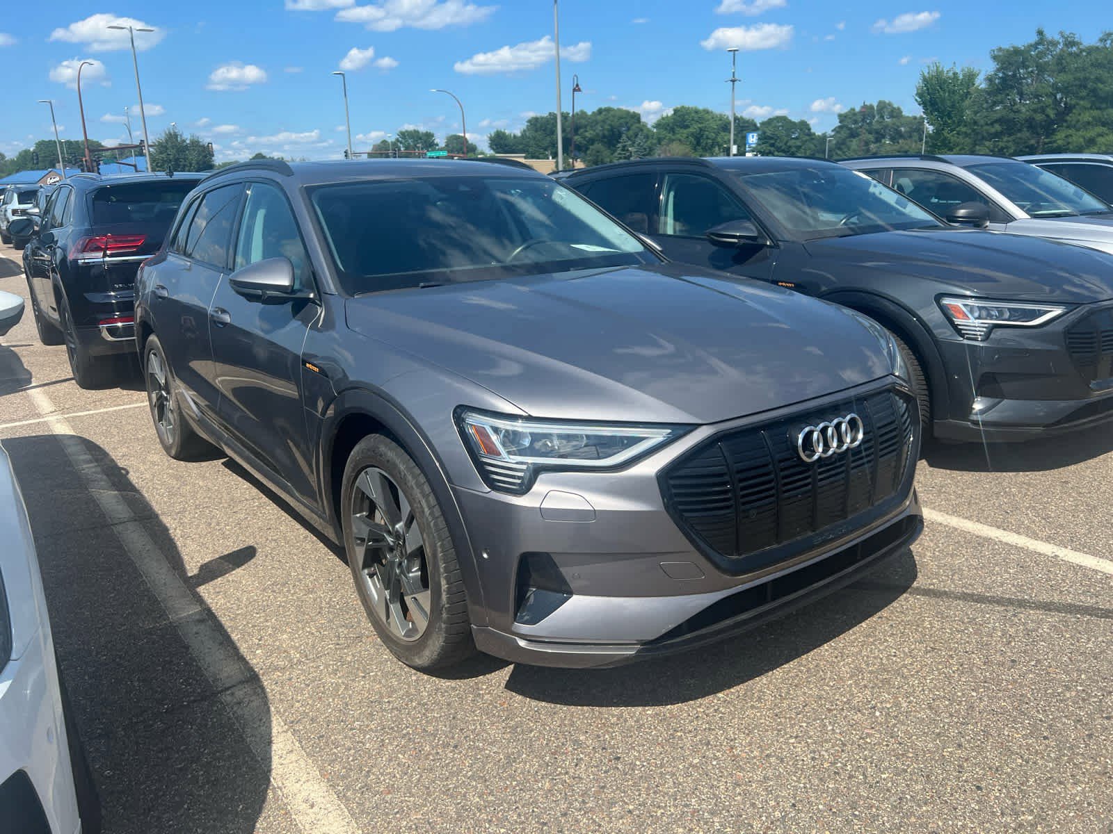 Used 2021 Audi e-tron Premium with VIN WA1AAAGE0MB012761 for sale in Brooklyn Center, Minnesota