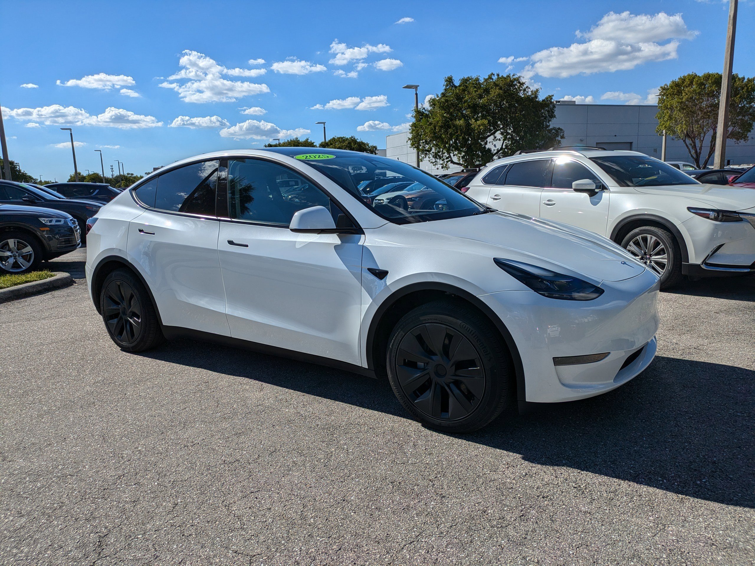 Used 2025 Tesla Model Y Long Range with VIN 7SAYGDED3SA375659 for sale in Northfield, Minnesota
