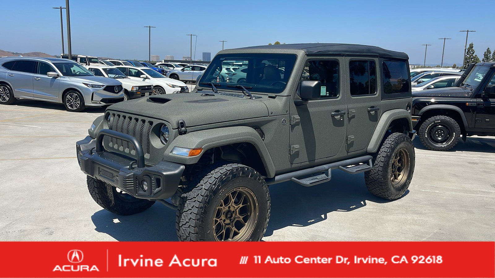 Used 2022 Black Clearcoat Jeep Unlimited Sport S image 1