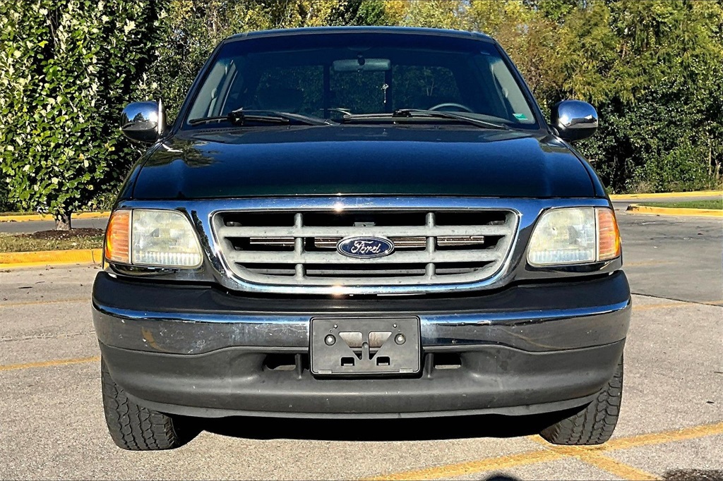 Used 2002 Ford F-150 XLT with VIN 1FTRX17L12NA24502 for sale in Kansas City