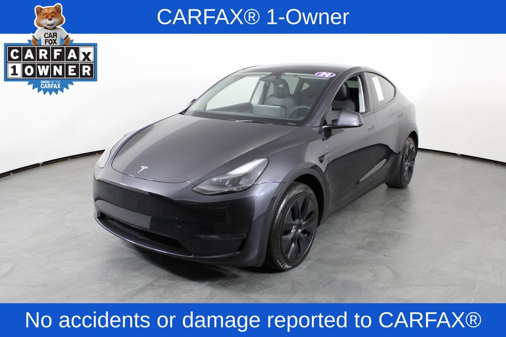 Used 2024 Tesla Model Y Long Range with VIN 7SAYGDED4RF098291 for sale in Orlando, FL