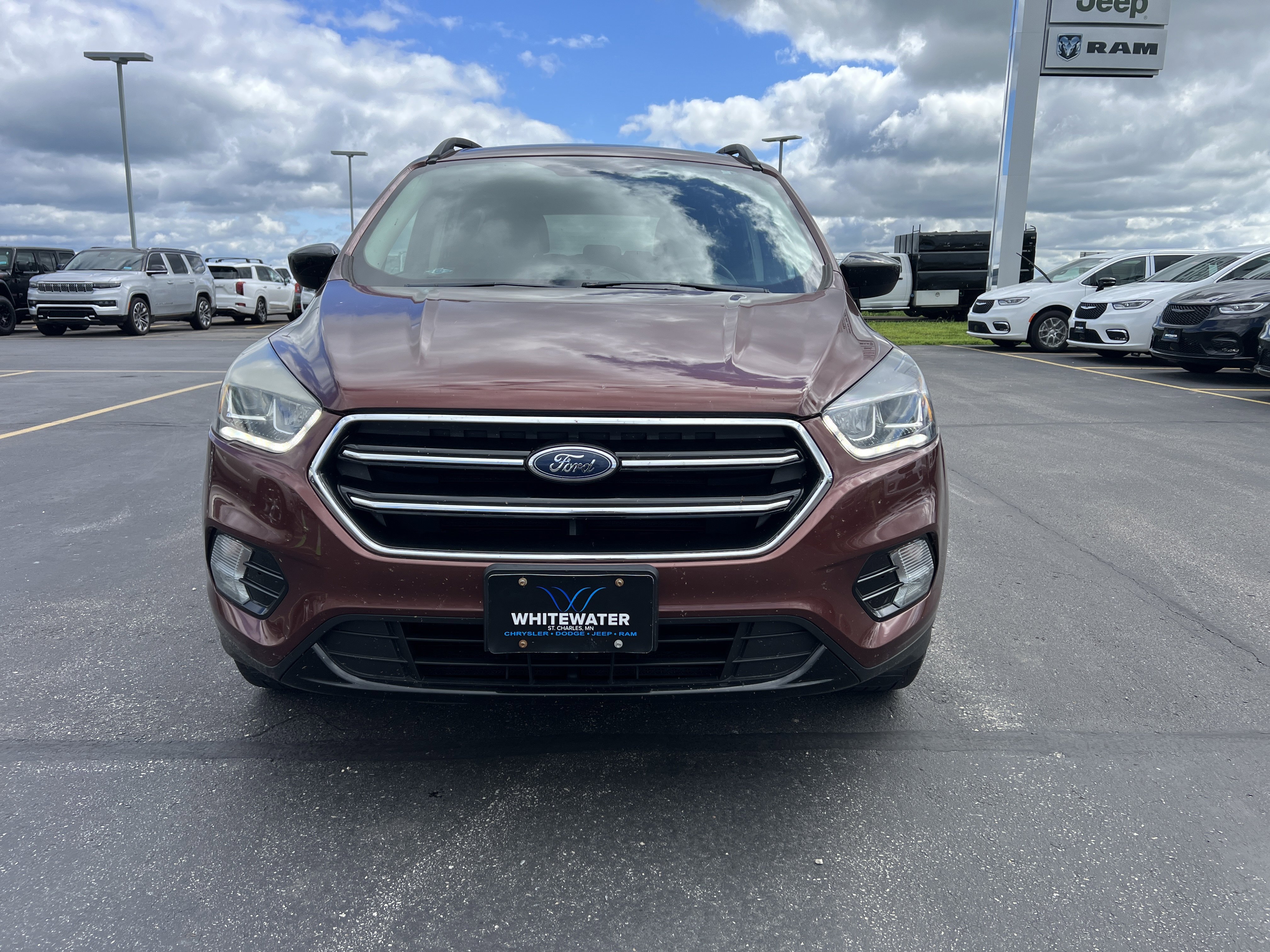 Used 2018 Ford Escape SE with VIN 1FMCU9GD4JUC19306 for sale in Saint Charles, Minnesota