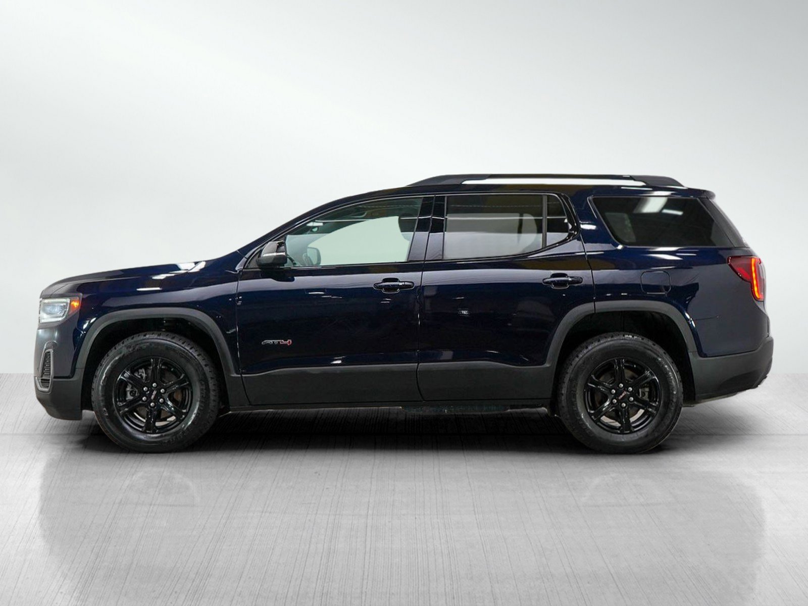 Used 2021 GMC Acadia AT4 with VIN 1GKKNLLS3MZ144740 for sale in Wayzata, Minnesota