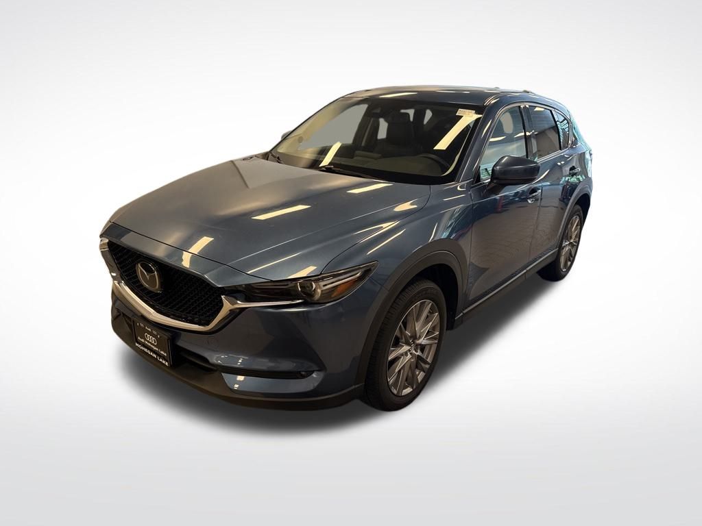 Used 2020 Blue Mazda Grand Touring image 1
