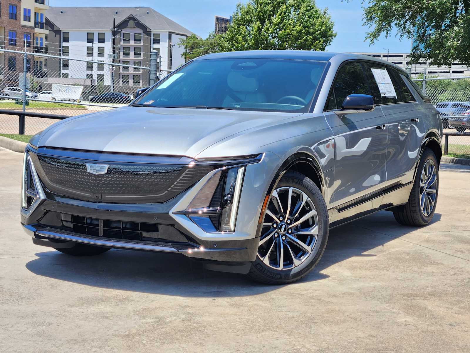 New 2025 Argent Silver Metallic Cadillac Sport 1 image 1