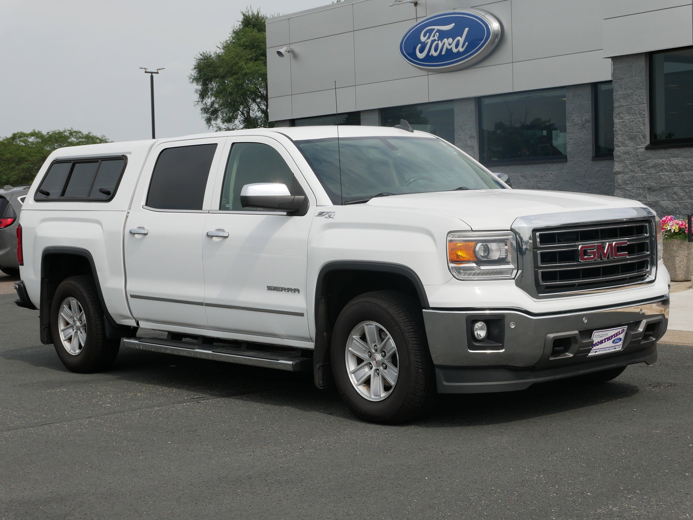 Used 2015 GMC Sierra 1500 SLT with VIN 3GTU2VEC6FG358428 for sale in Northfield, Minnesota