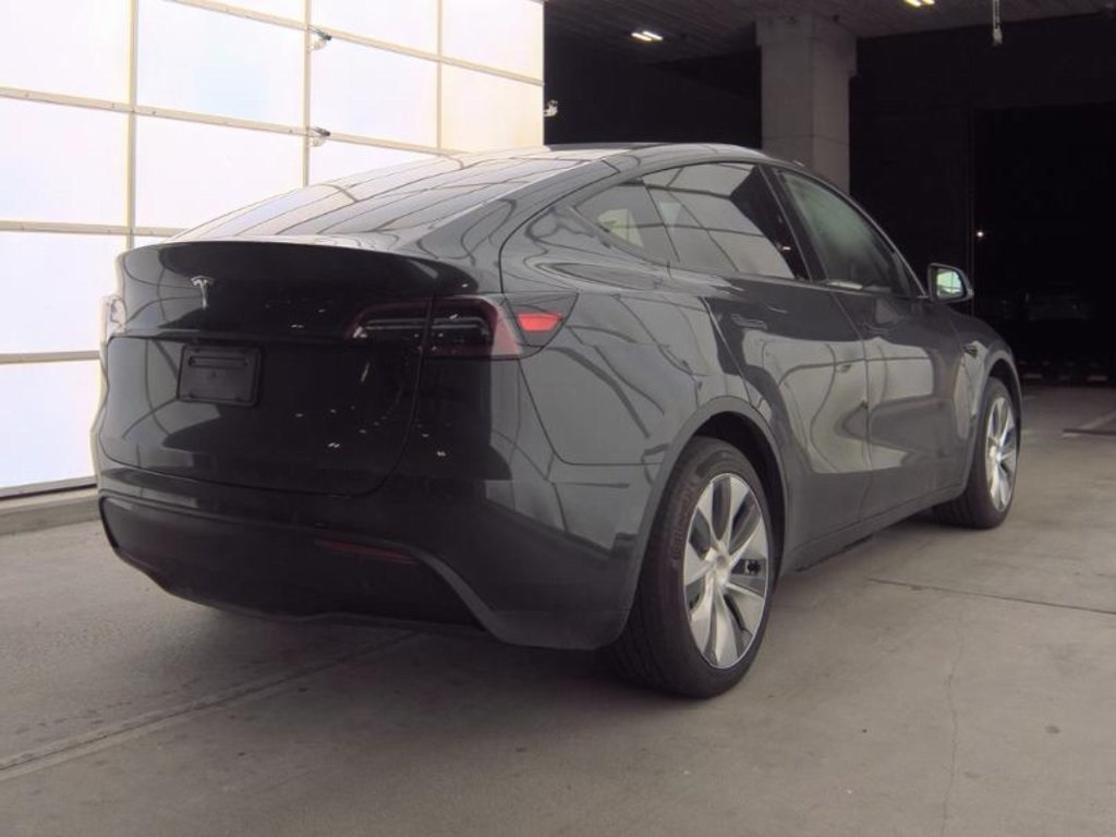 Used 2024 Tesla Model Y Long Range with VIN 7SAYGDED9RF002588 for sale in Plano, TX