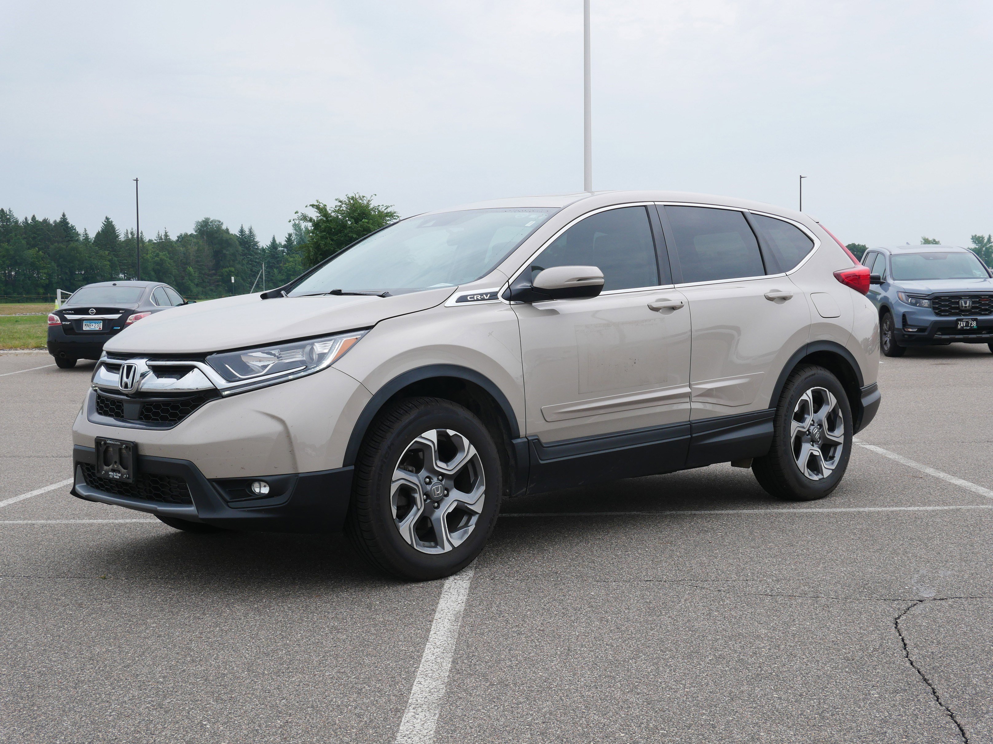 Used 2019 Honda CR-V EX with VIN 2HKRW2H53KH644325 for sale in Waite Park, Minnesota