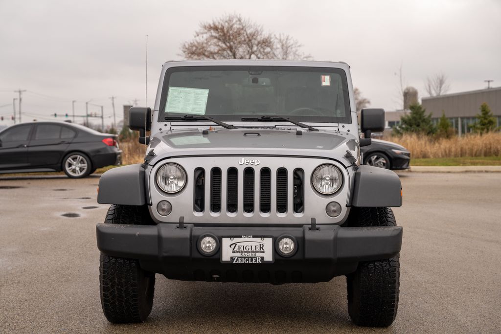 Used 2014 Jeep Wrangler Unlimited Rubicon with VIN 1C4BJWFGXEL119581 for sale in Mount Pleasant, WI