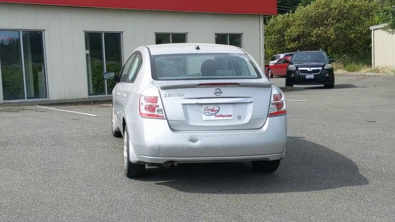 Used 2011 Silver Nissan S image 1