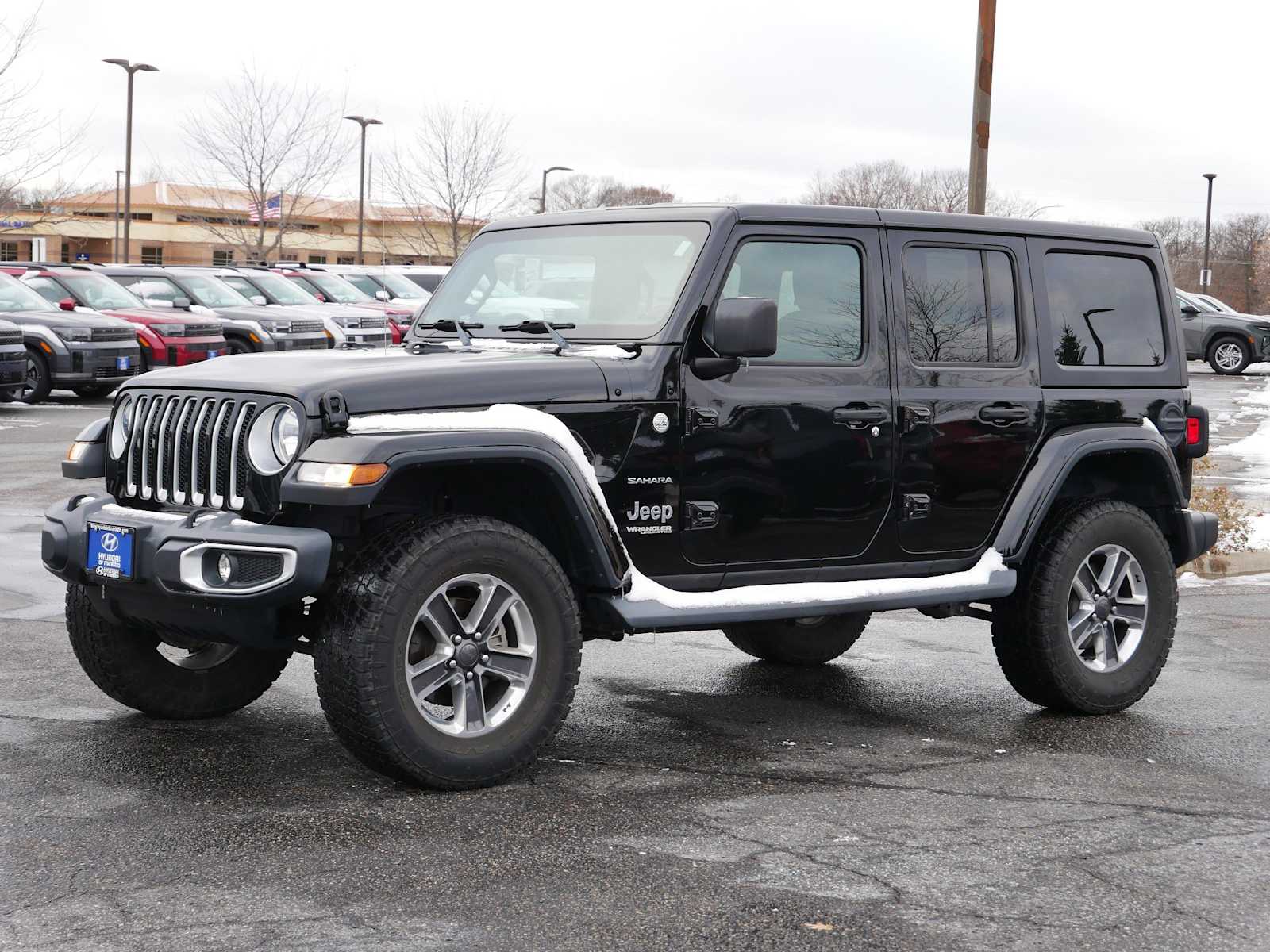 Used 2019 Jeep Wrangler Unlimited Sahara with VIN 1C4HJXEN2KW593034 for sale in Mankato, Minnesota