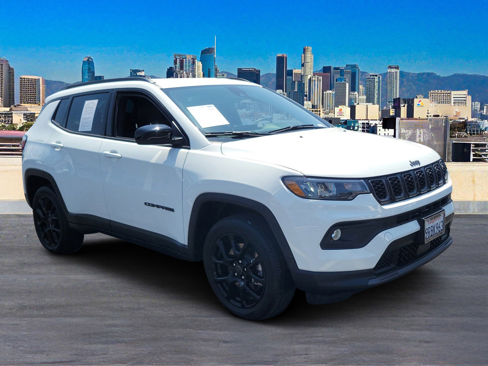Used 2025 Bright White Clearcoat Jeep Latitude image 4