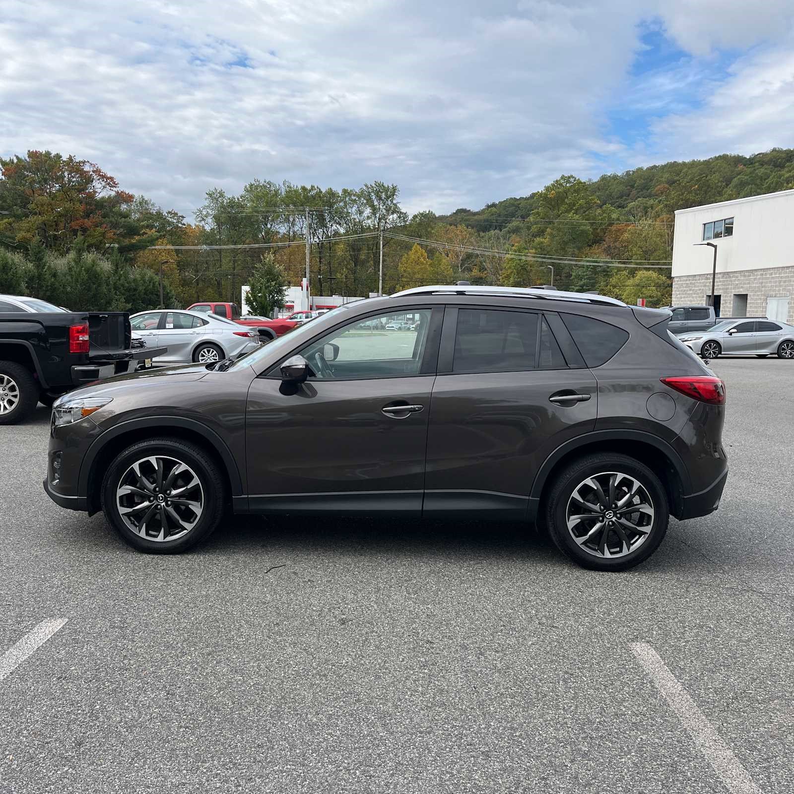Used 2016 Mazda CX-5 Grand Touring with VIN JM3KE4DY8G0855337 for sale in Minneapolis, Minnesota
