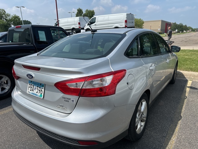 Used 2014 Ford Focus SE with VIN 1FADP3F2XEL167601 for sale in Apple Valley, Minnesota